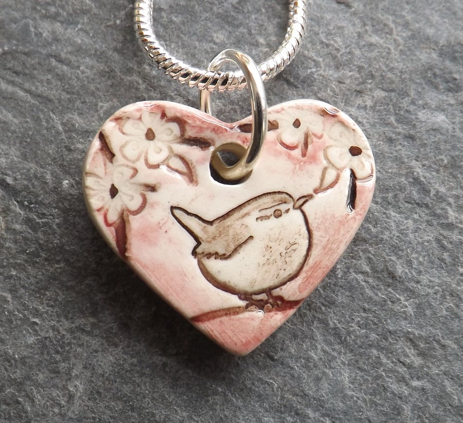 Heart shaped ceramic Wren in the Blackthorn pendant in pink