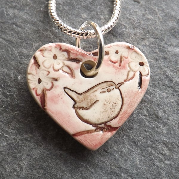 Heart shaped ceramic Wren in the Blackthorn pendant in pink
