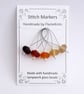 Lampwork Stitch Markers - Frosted Amber Gradient - Image 1