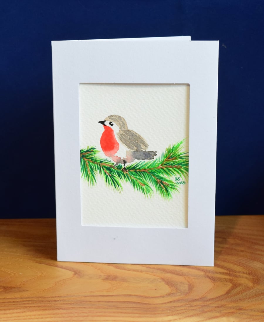 Yule robin on evergreen branch - watercolour, greeting card