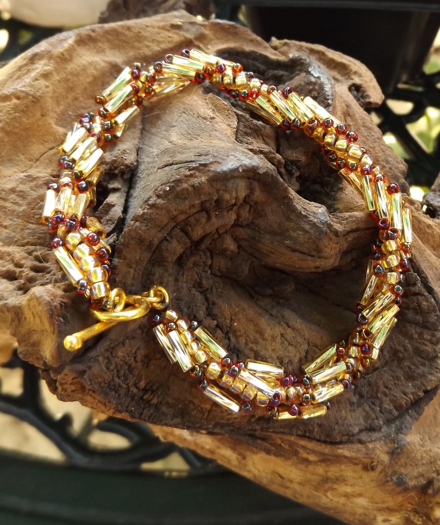 Spiral gold and red seed beaded bracelet 
