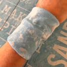 Cuff wrist band bracelet in tie dye look