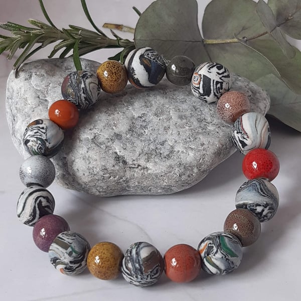 White, black and bronze polymer clay stretch beaded bracelet