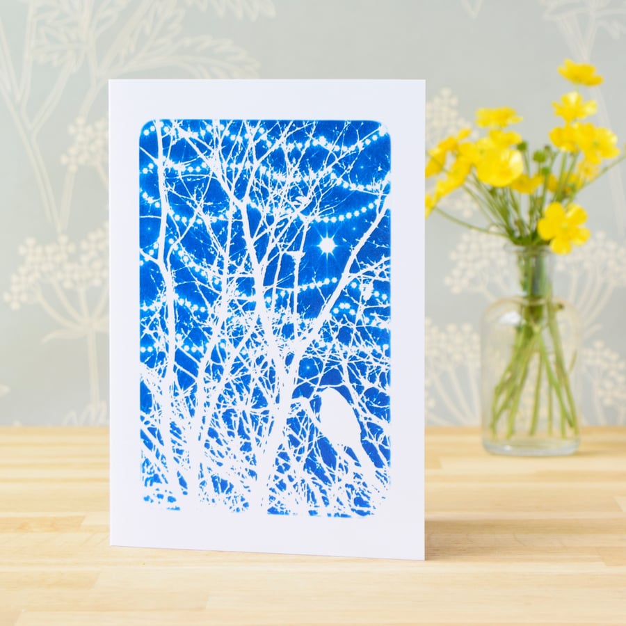 Bird in branches with tree lights Cyanotype art card