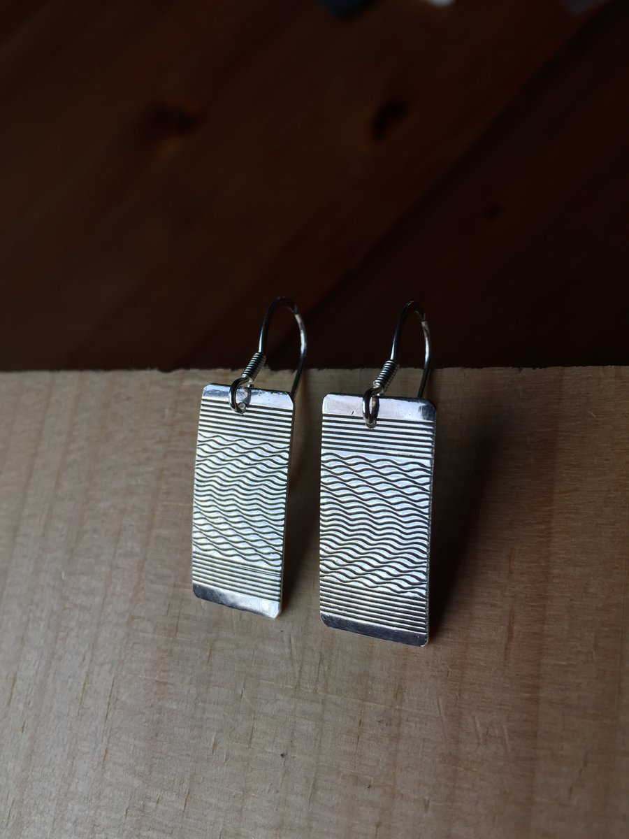 Oblong waves engine turned silver earrings