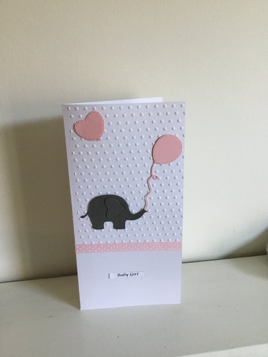 Embossed baby Girl Elephant, heart and balloon card. CC195