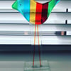 Fused glass standing rainbow bird 