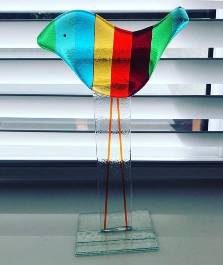 Fused glass standing rainbow bird 