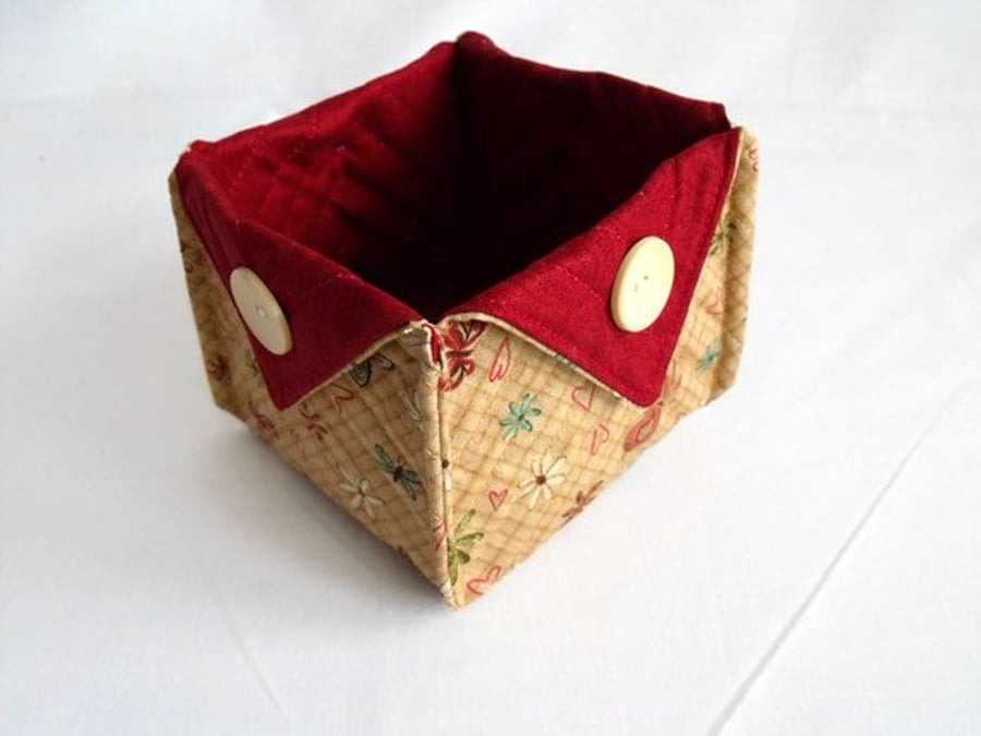  folded fabric storage tub for your bits and bobs, tan and burgundy