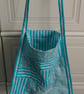 Lightweight green and white patchwork tote bag with internal pockets - Image 1