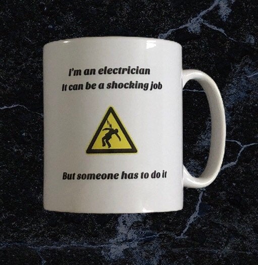 "I'm an electrician. It can be a shocking job but someone has to do it" Mug. 