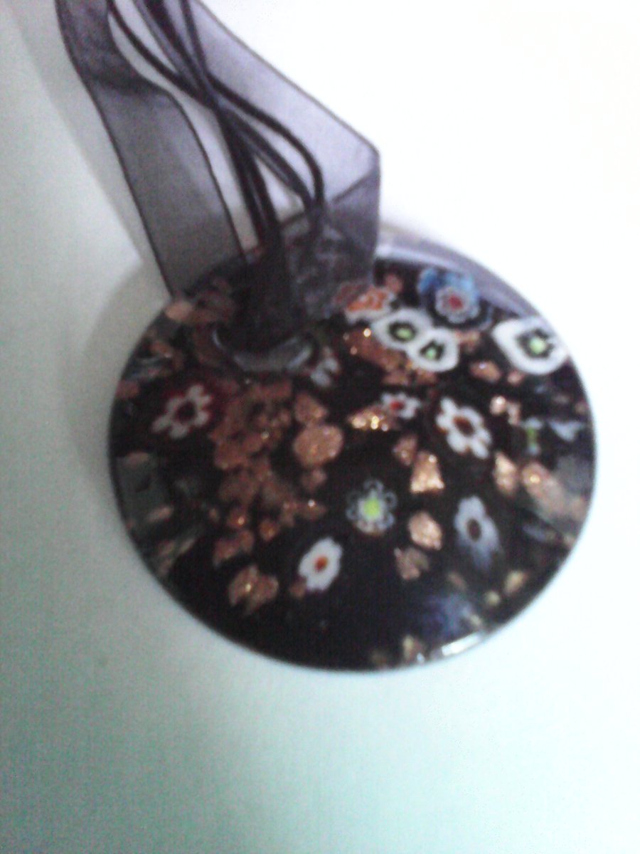 A  Sparky Round Glass Colourful Pendant Black Background