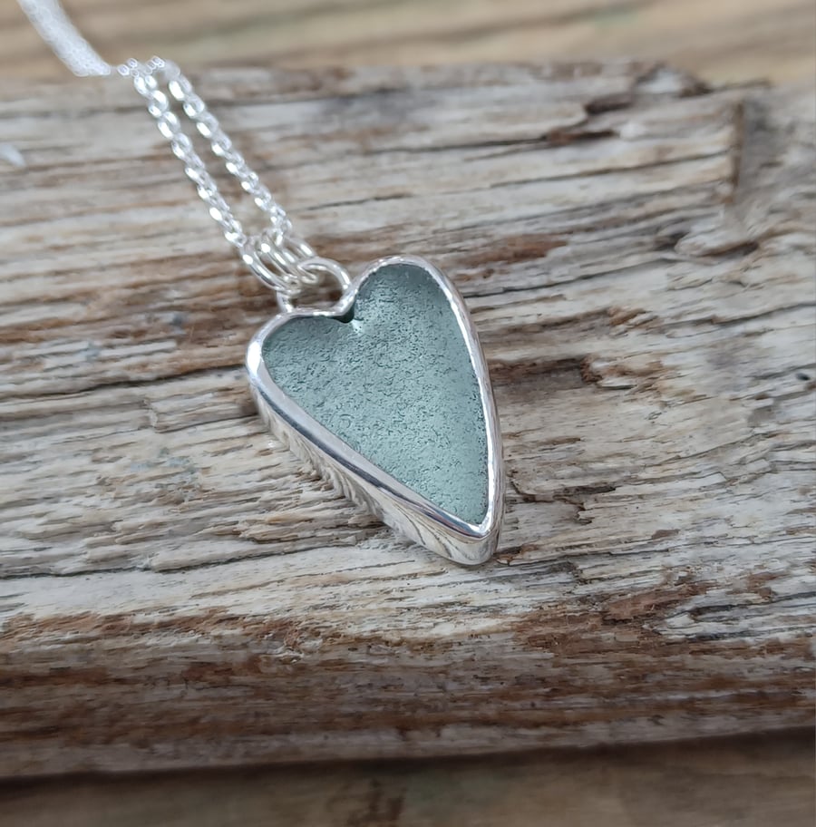Sea glass heart pendant  set in silver , boho necklace 