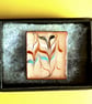 brooch - rectangular - scrolled rod on clear enamel - Image 2