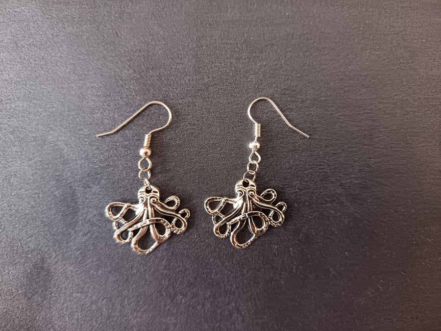 Silver octopus charm dangle earrings 