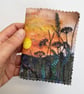 Sunset countryside sewing needle and pins case. 