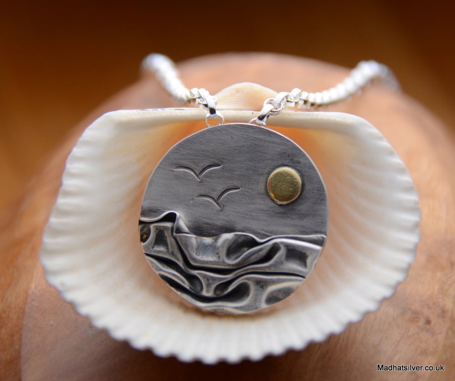 Silver beach, sea mountain coast pendant, with brass sun and seagulls