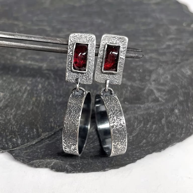 Oxidised textured silver and garnet stud earrings with hoop dangle