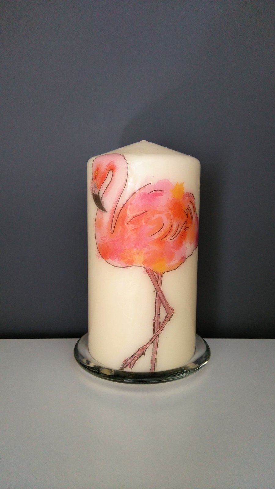 flamingo decorated candle