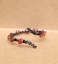 Twisted wire bracelet cuff with burnt orange , amber tones agates
