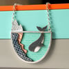 Diving whale necklace