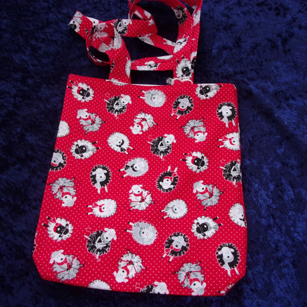 Red Spotted Fabric Bag with Black & White Sheep