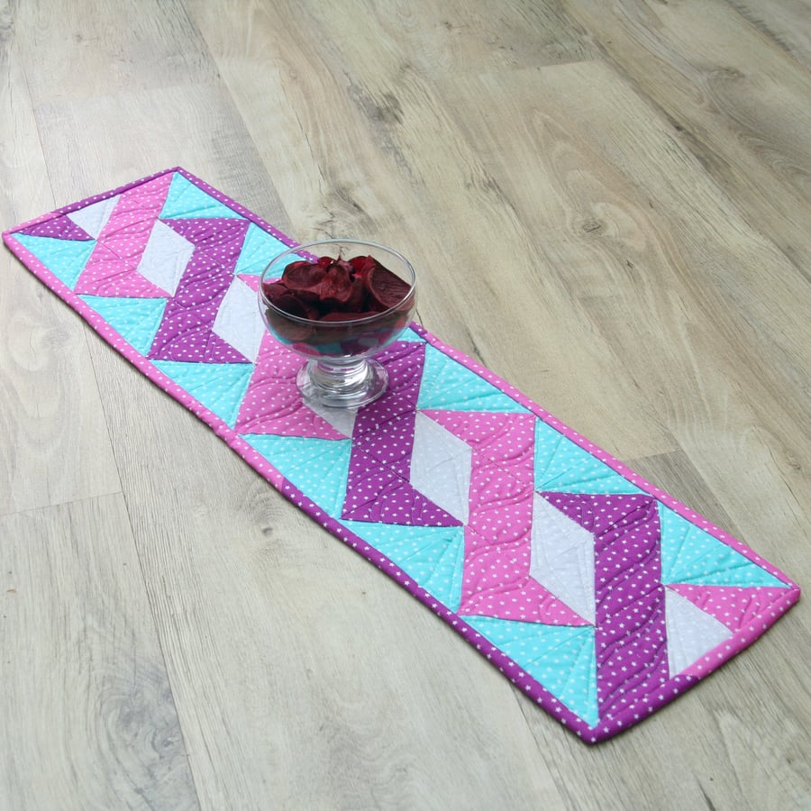 Colourful Twisted Pole Table Runner with tiny stars.