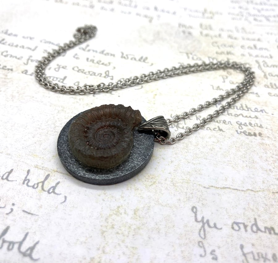 Matte grey ammonite in resin on wooden circle pendant gifts for fossil lovers