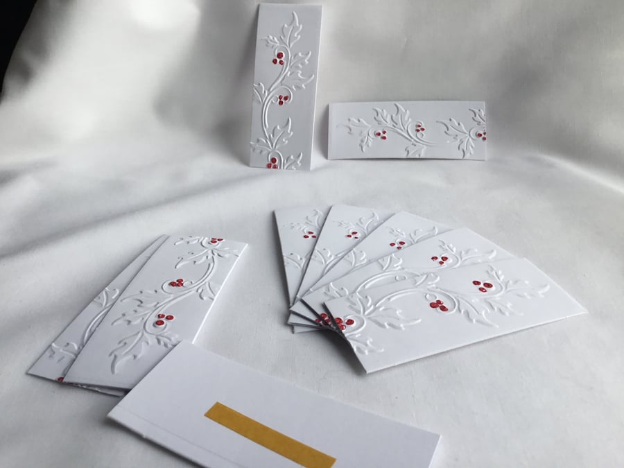 Pack of 10 holly embossed gift tags. CC394. Seconds Sunday