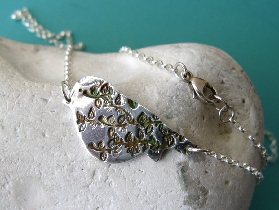 REDUCED! Fine silver bird necklace with leafy pattern