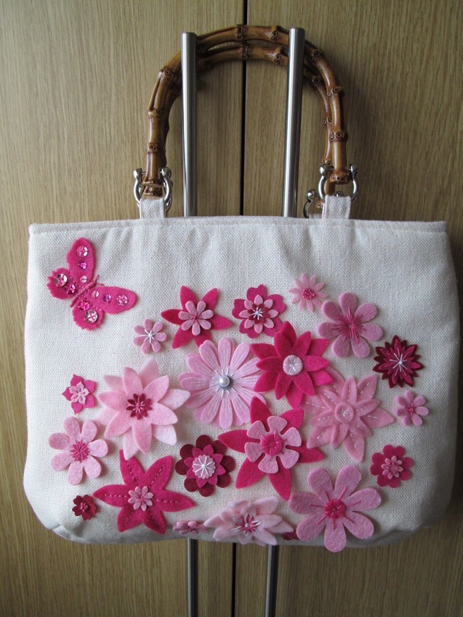 Large Cream Handbag with Pink Felt Flower Decoration and Faux Bamboo Handles