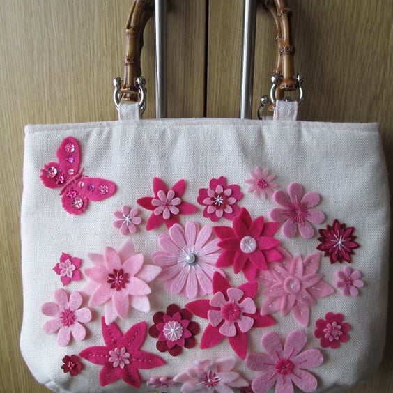 Large Cream Handbag with Pink Felt Flower Decoration and Faux Bamboo Handles