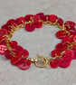 Red button bracelet with gold chain and toggle clasp  - Image 5