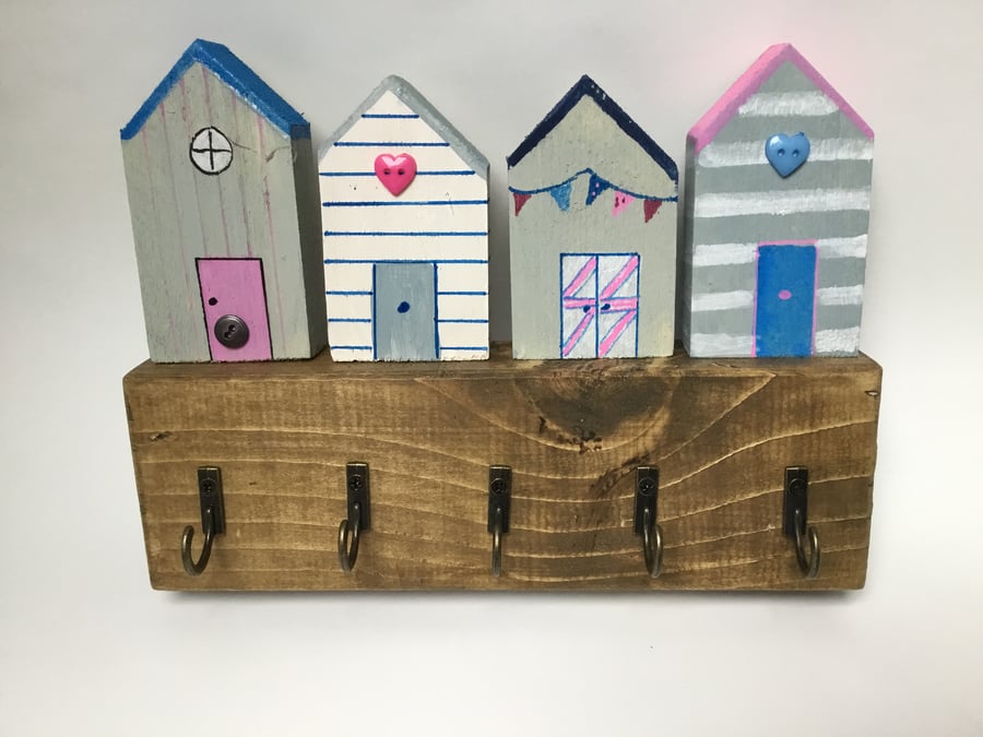 Rustic pretty beach hut key hooks made from recycled wood. 
