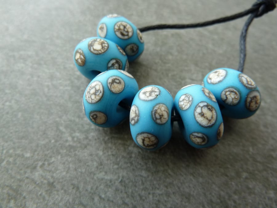 handmade lampwork glass beads, blue and ivory spots