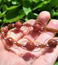 Sparkling Goldstone and Rosegold Hematite Macrame Bracelet 19cm - Image 3