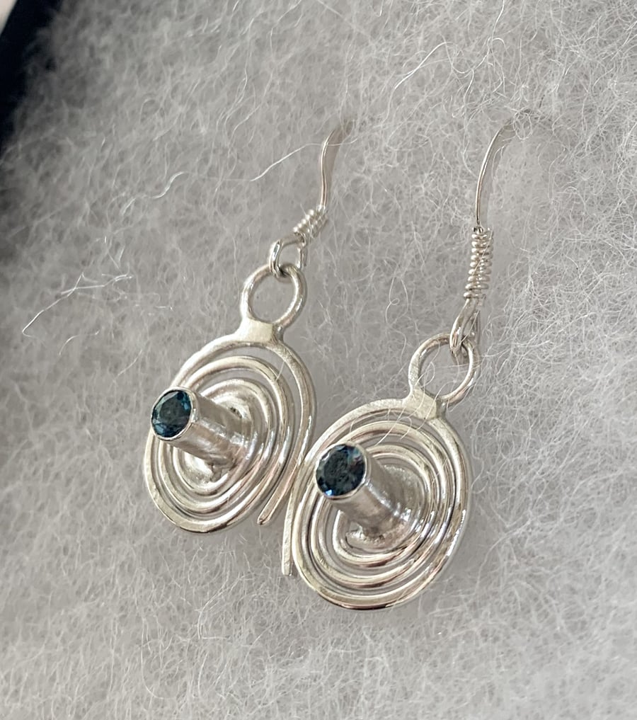 Spiral sterling silver drop earrings with London blue topaz