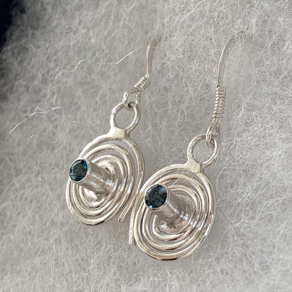 Spiral sterling silver drop earrings with London blue topaz