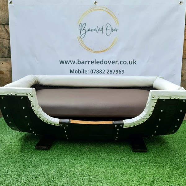 Handmade Luxury padded whiskey barrel dog bed made to order