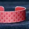 Geometric scallop pattern cuff bracelet red