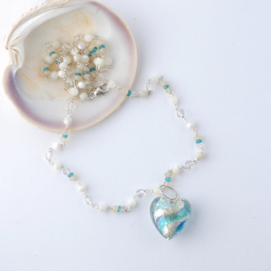 Swirly blue murano glass heart necklace