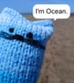 Ocean cat-knit.