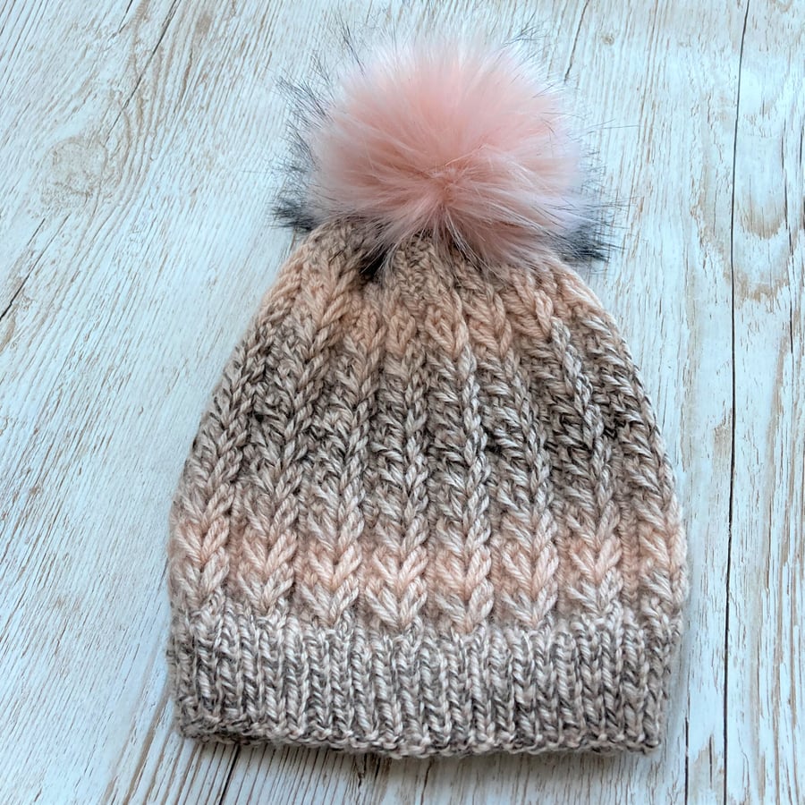 Hand knitted Adult beanie hat in Blush pink and beige with faux fur pompom