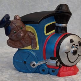 Ceramic Hand Painted Brown Teddy Bear Blue Train Engine Ornament.