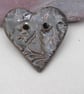 Medium Obsidian Brocade Texture Heart Shaped Ceramic Button - Image 1