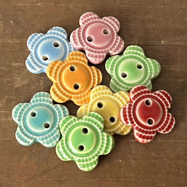 Set of eight little handmade ceramic flower buttons multi coloured
