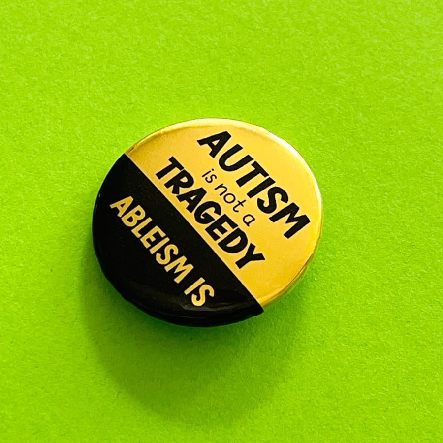 Autism is not a tragedy badge, pocket pebble, magnet or keyring. 