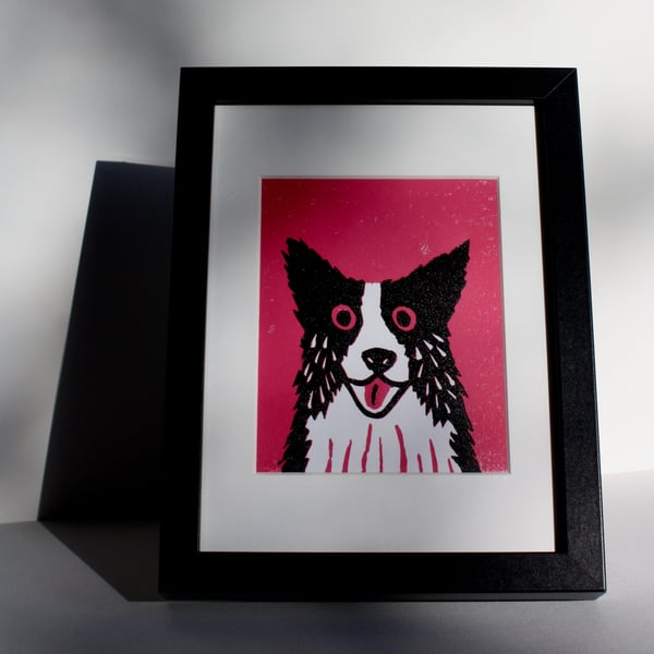 BORDER COLLIE DOG ON PINK- ORIGINAL LINOCUT FRAMED IN BLACK-FREE POSTAGE