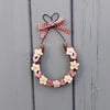 Real Horseshoe decorated with Pottery Hearts and Flowers