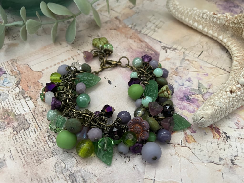 Beautiful glass beaded lilac and green charm bracelet 